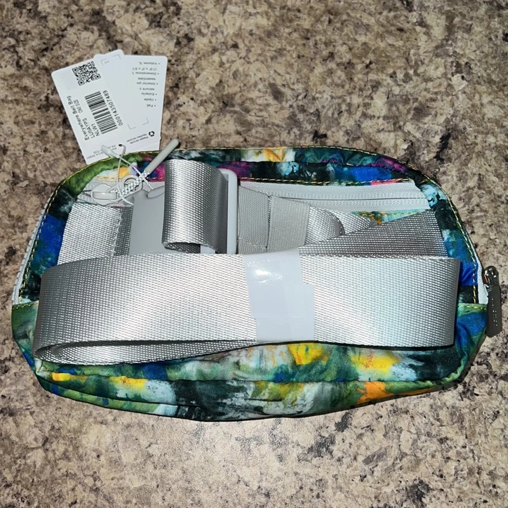 lululemon athletica abstract splash cosmetic pouch in yellow, pink, teal, orange